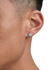 Model wearing white gold moissanite earrings by Iceman Society