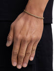 Model wearing 4mm 18k gold rope chain set by Iceman Society, side view