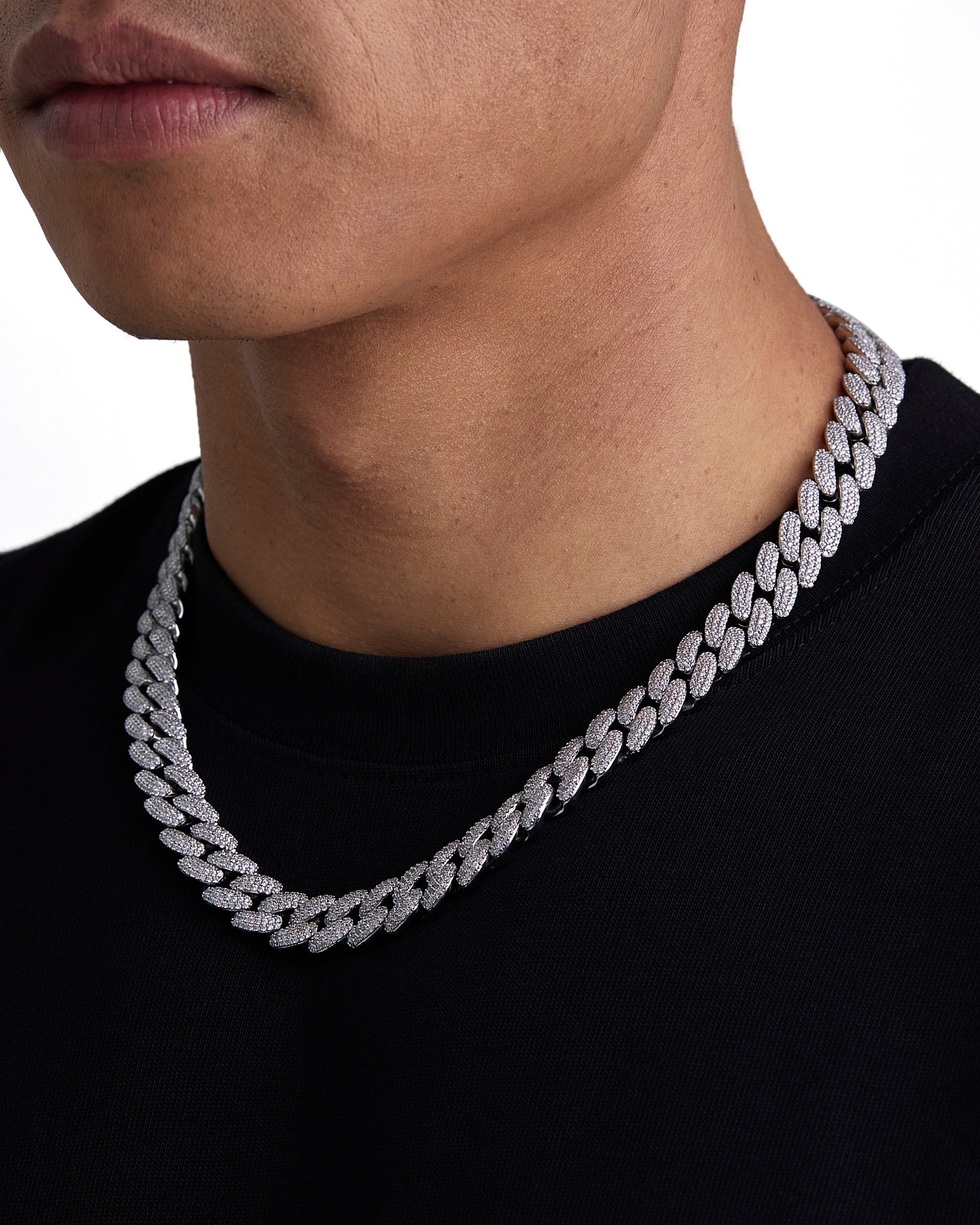 Model wearing 12mm white gold iceman cuban necklace by Iceman Society, side view
